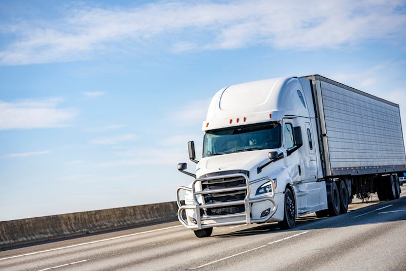 Commercial truck driving on road