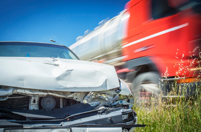 A car that has been hit by a truck