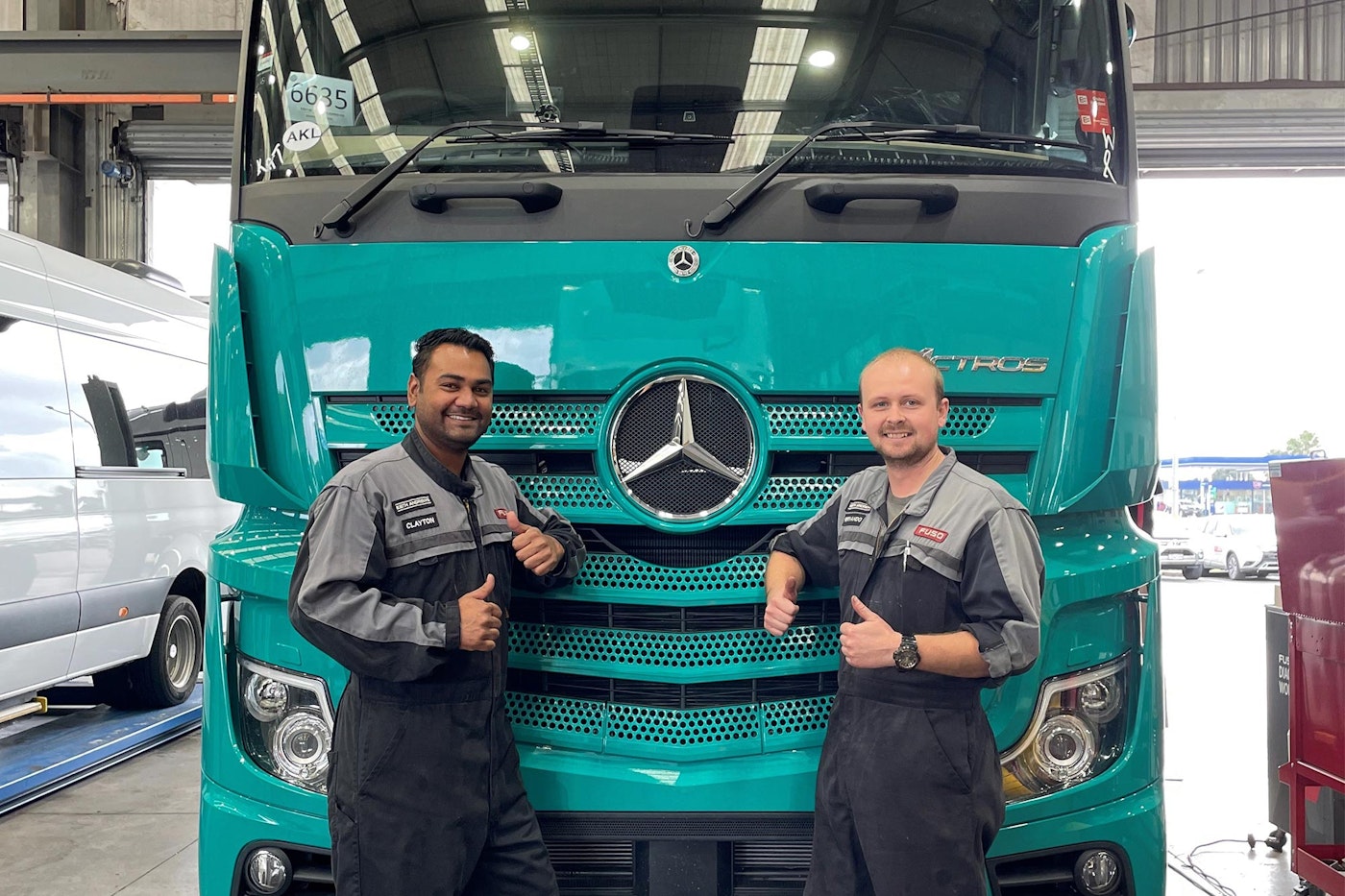 Cory and Dainton infront of Mercedes-Benz Actros from Keith Andrews.