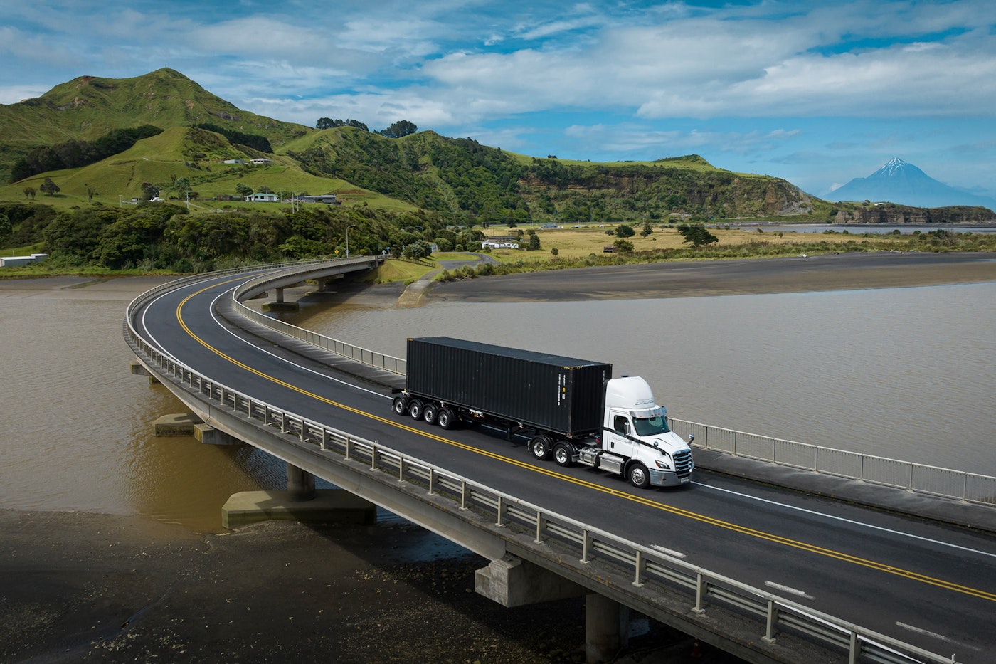 Freightliner Cascadia from Keith Andrews crossing bridge.
