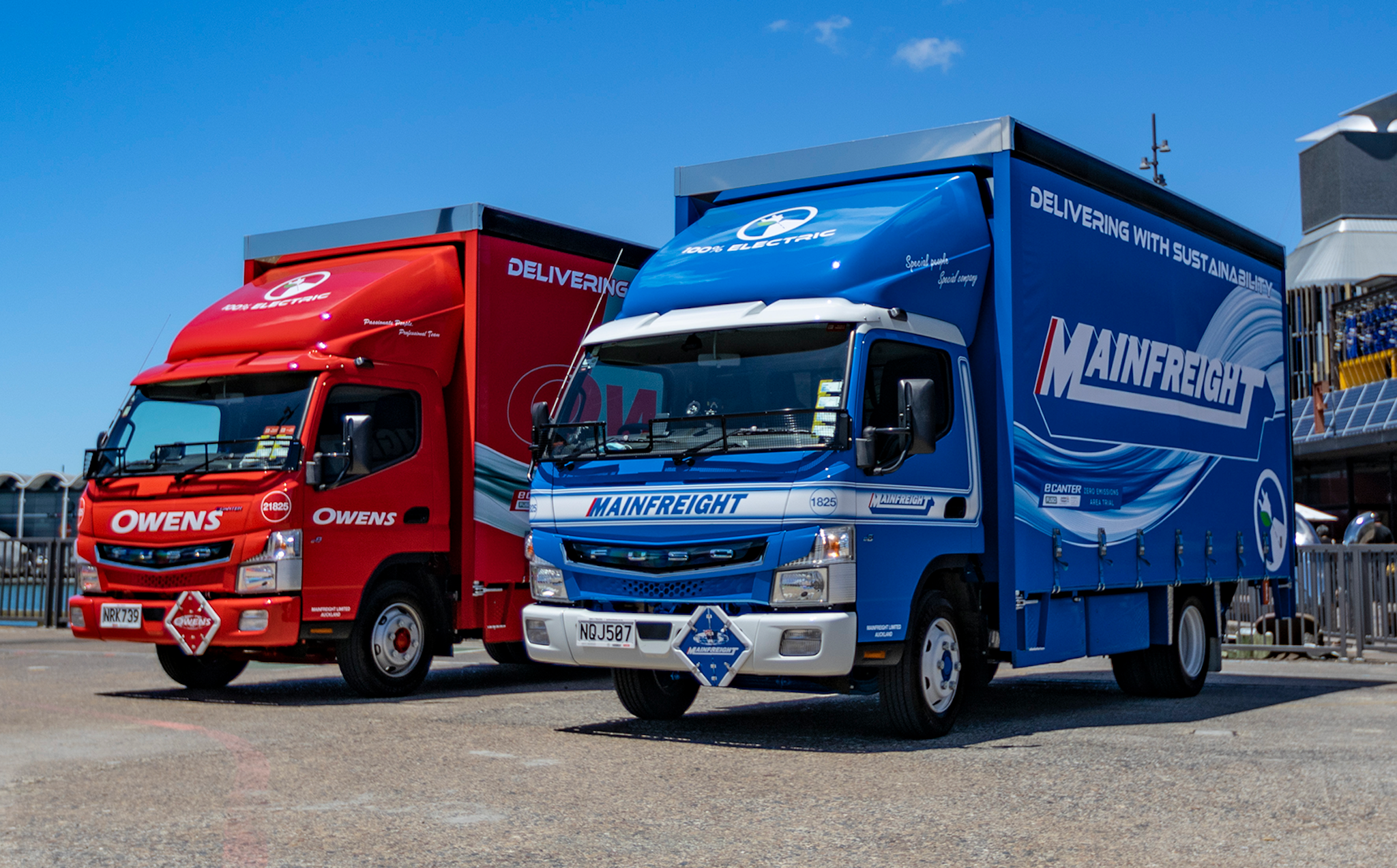 Mainfreight and Owens' FUSO eCanter curtainsiders from Keith Andrews.