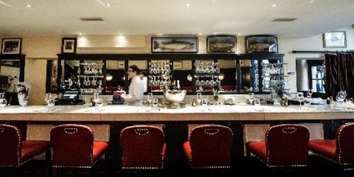 Bar with red bar stools