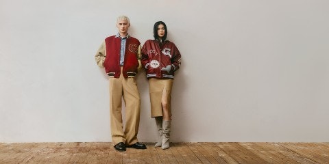 Man and woman against a wall
