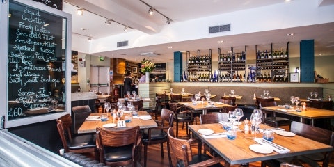 Restaurant with tables and cutlery