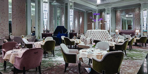 Tables and chairs inside a restaurant