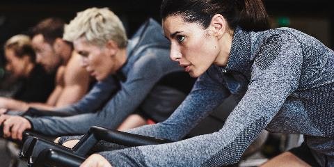 People on bikes indoors