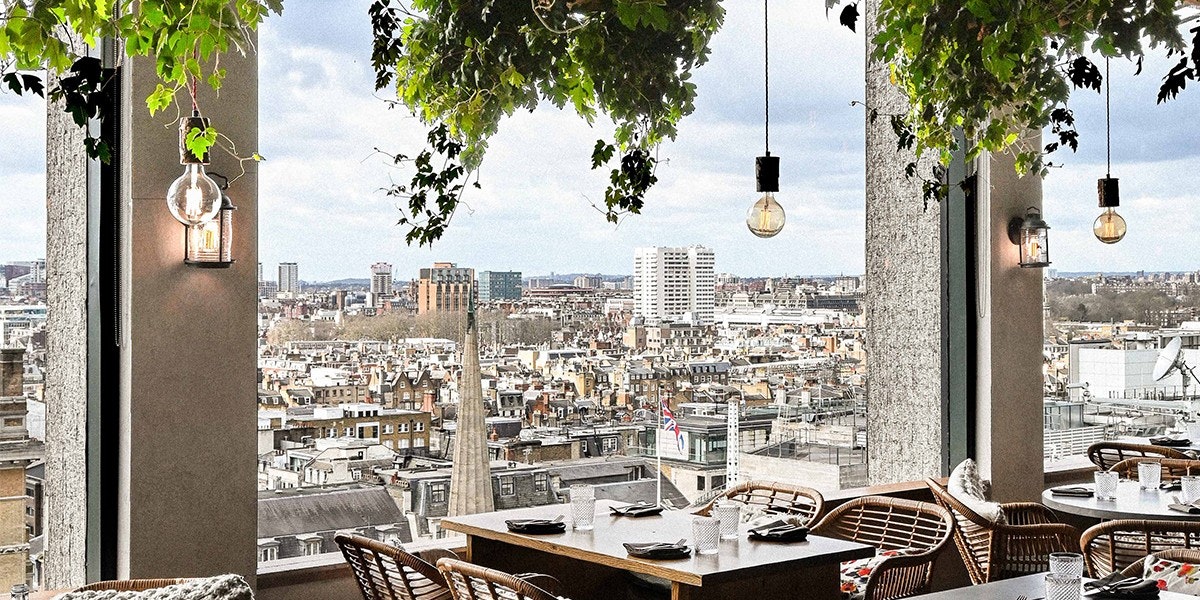 Restaurant table looking out above city
