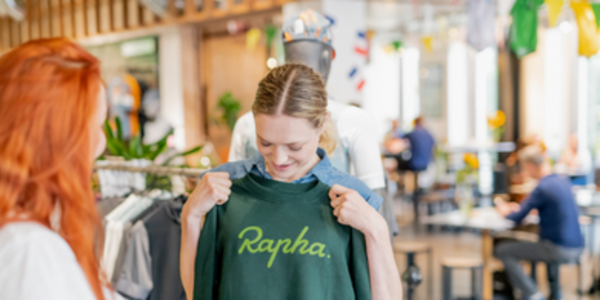 Green Rapha jumper on woman