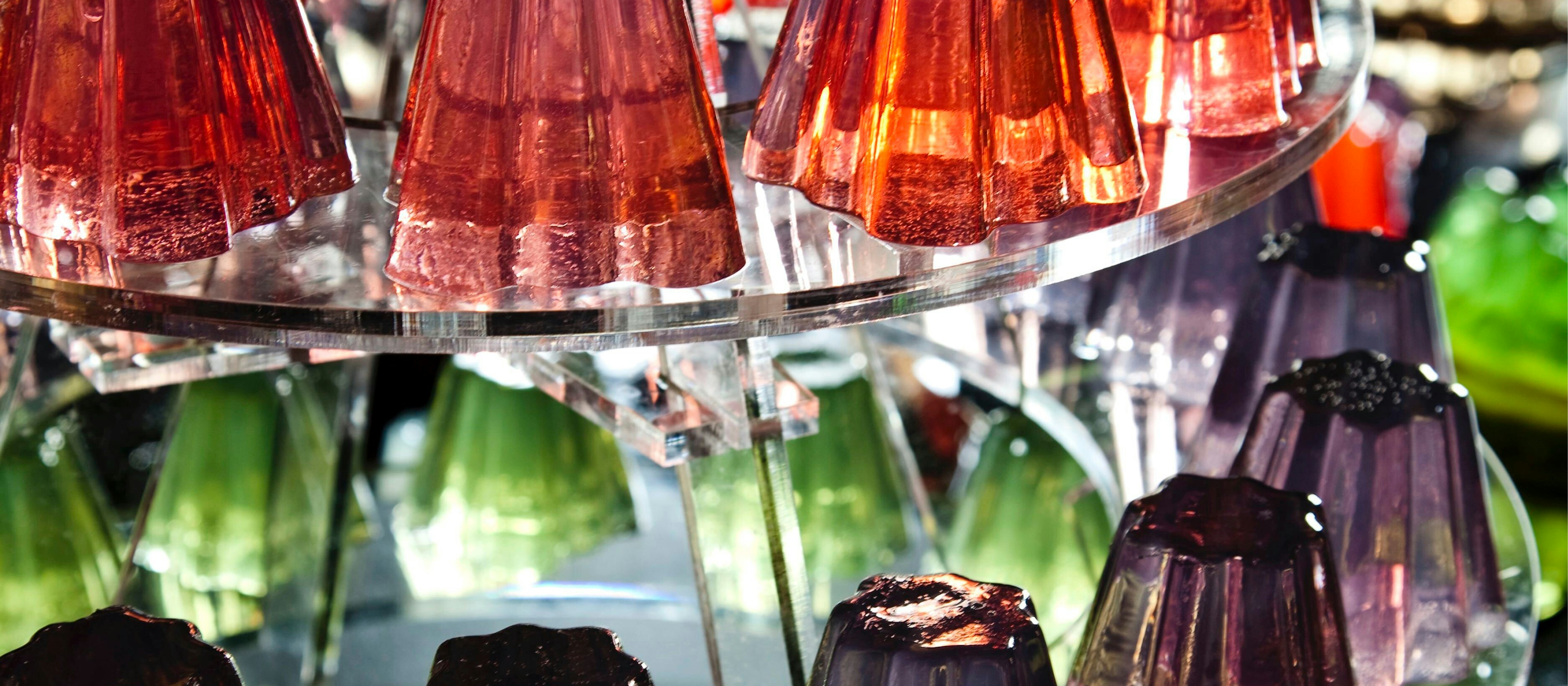 Red and purple jelly shaped as cups