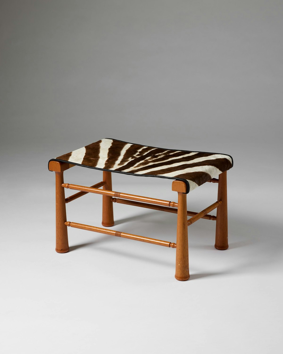 Stool 'Egyptian', model 972 designed by Josef Frank