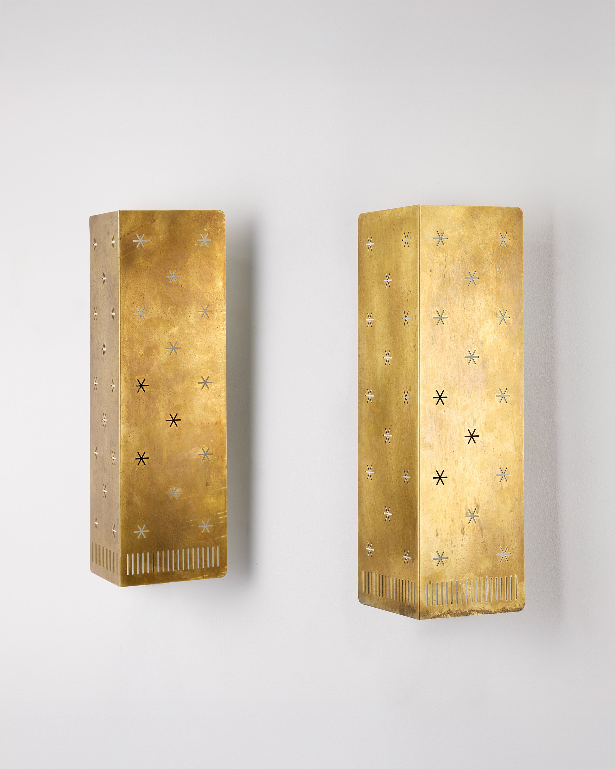 A pair of wall lamps 'Model 6200' designed by Paavo Tynell