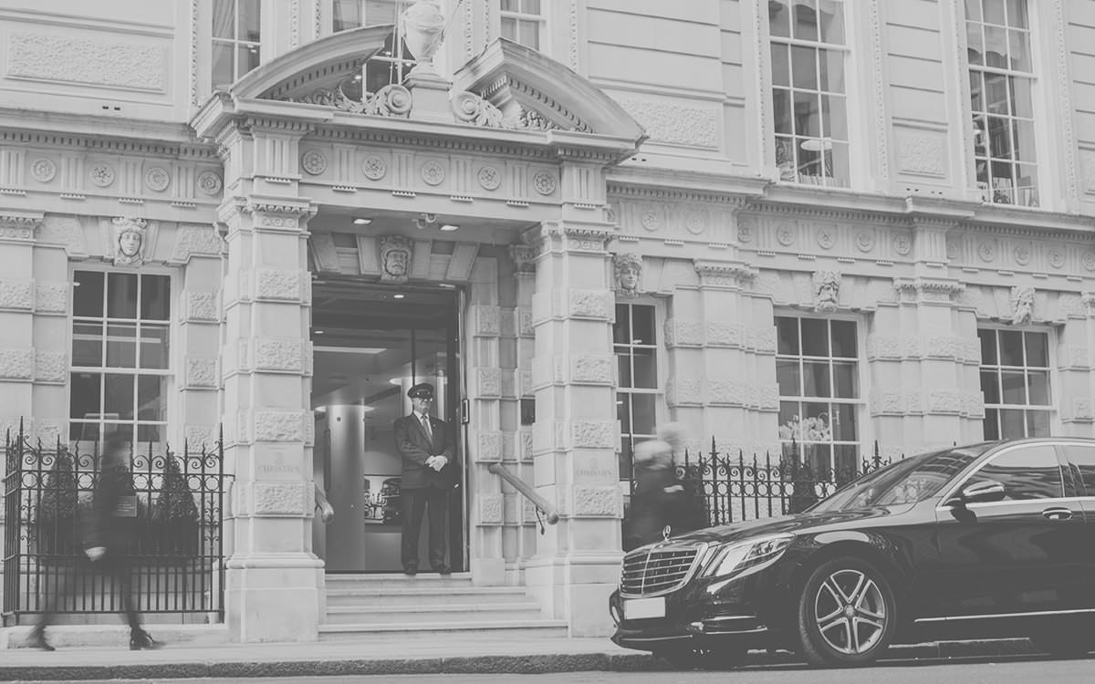 Black and white photo of building and people