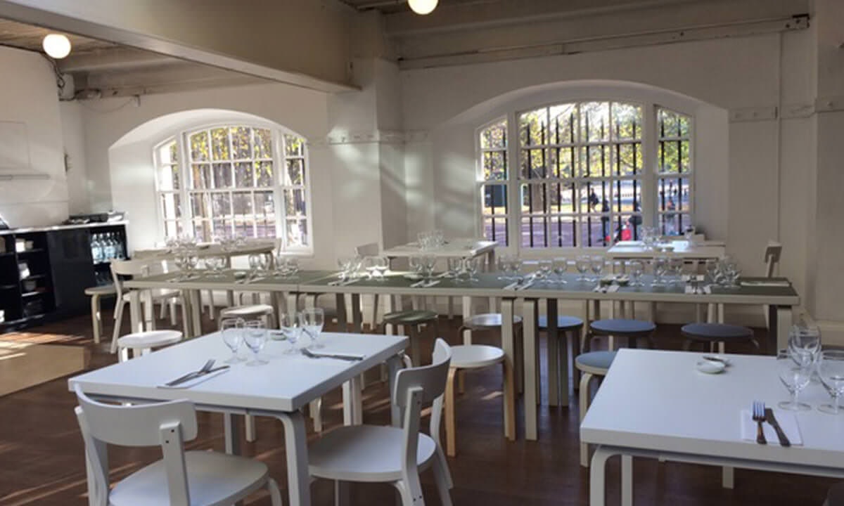 Dining room with white tables and chairs