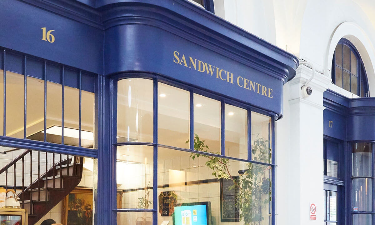 The Sandwich Centre sign on blue shop front