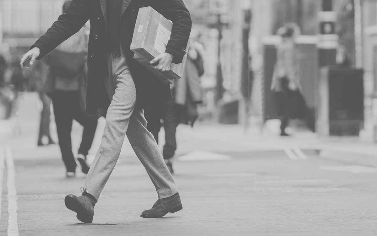 person walking with parcel
