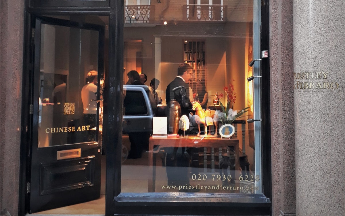 Looking into the window of a gallery