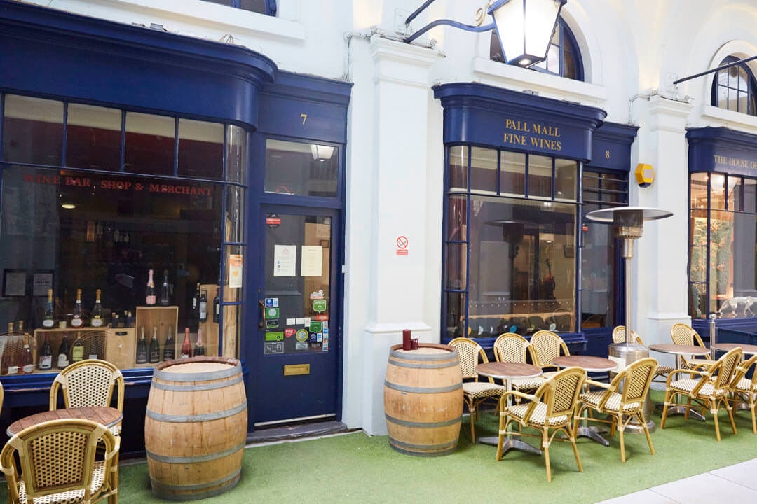 Barrells and chairs outside shop