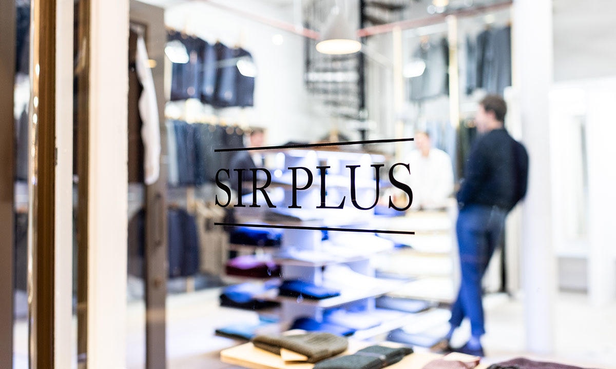 sirplus logo on a window
