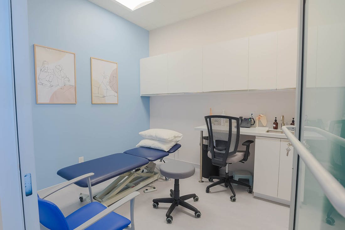 Speech-language pathologist working with an adult client