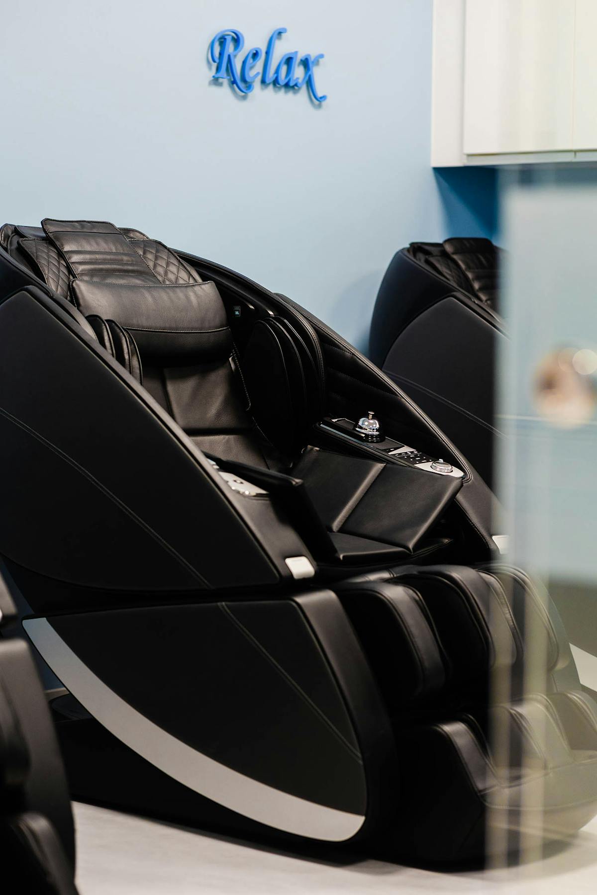 Person relaxing in a therapeutic massage chair