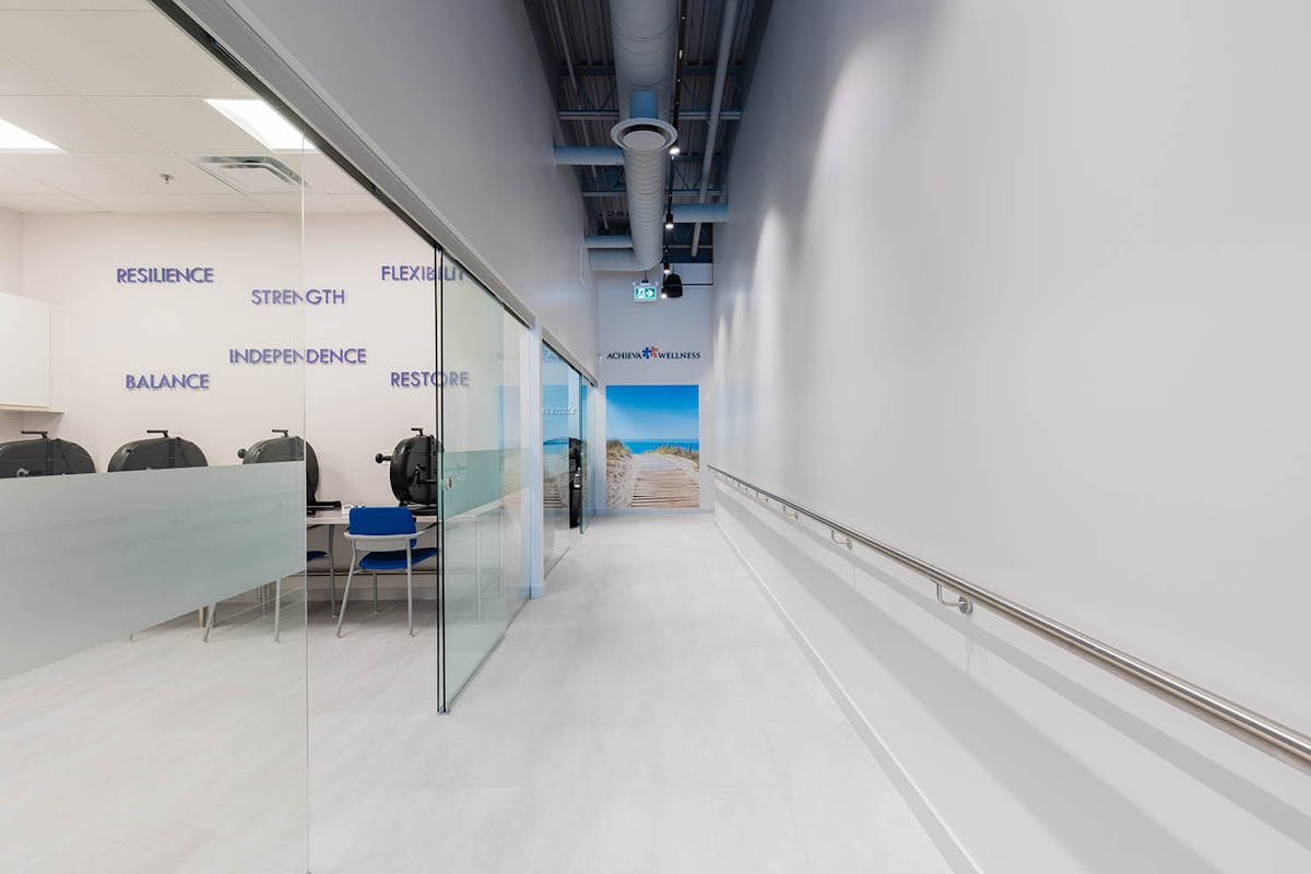 Speech-language pathologist working with an older adult