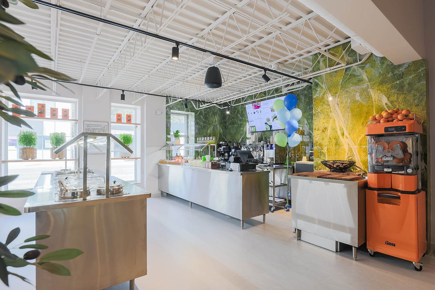 Healthy café drinks and snacks on a counter
