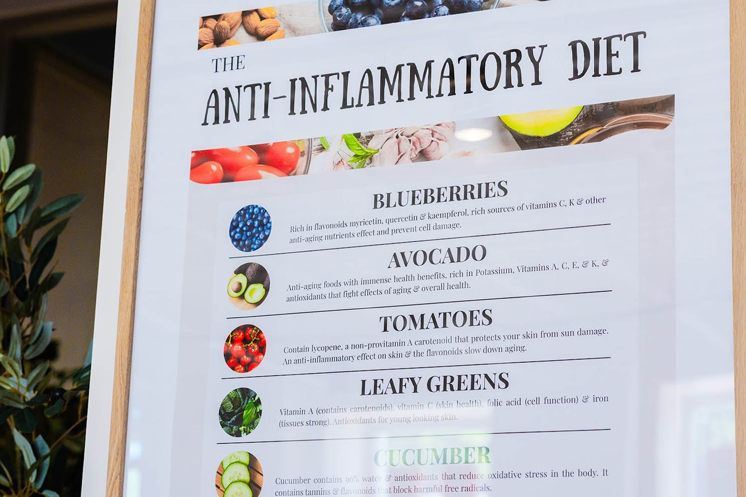 Person enjoying a healthy drink in a bright café setting