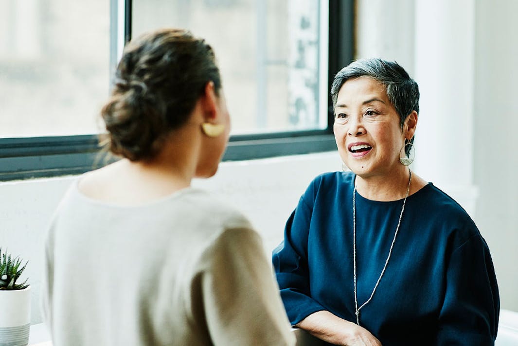 Older adult speaking with a clinician
