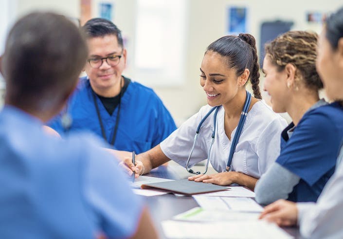 doctors looking at paperwork