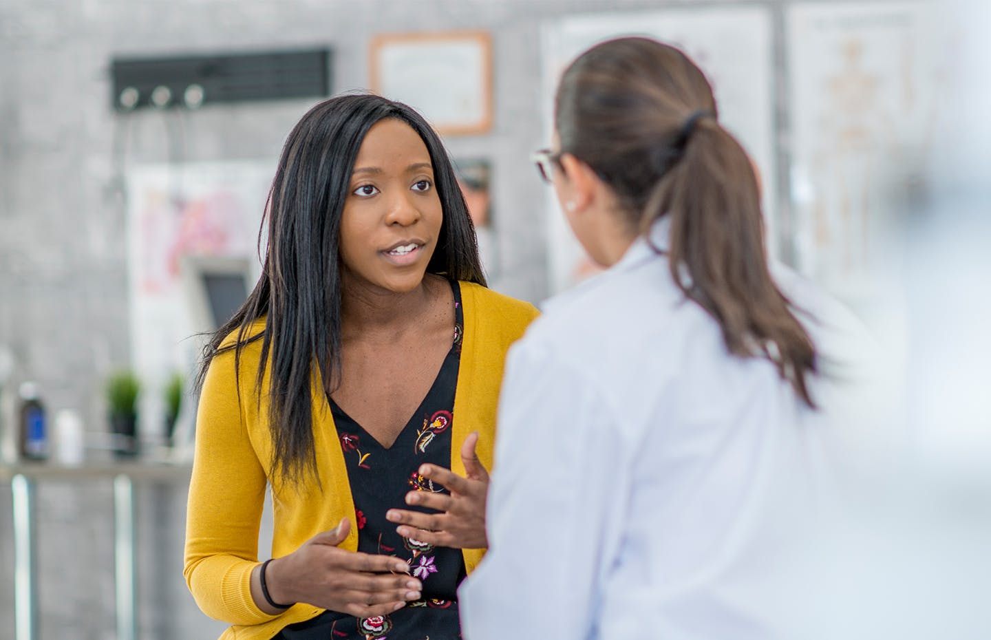 woman and doctor speaking