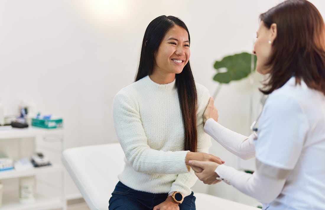 doctor and female patient speaking