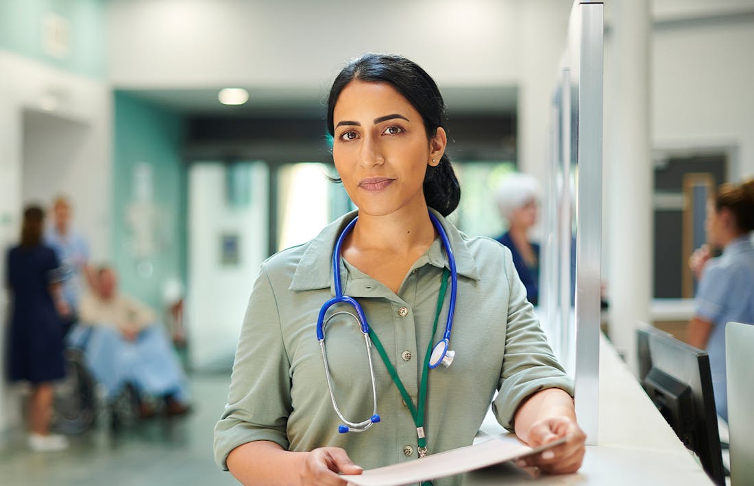 woman with a stethescope around her neck