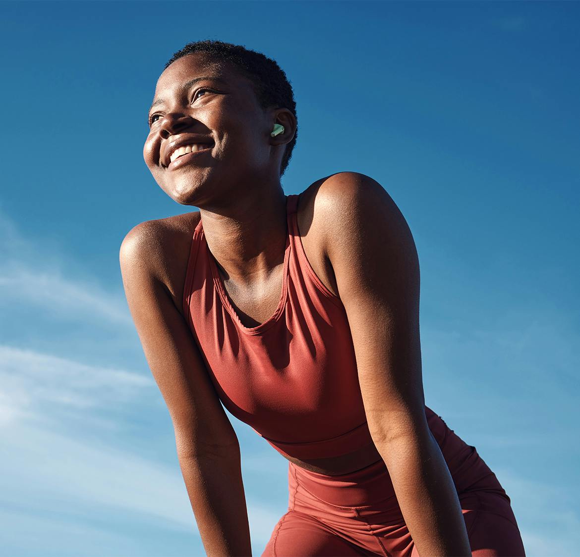 woman resting her hands on her legs