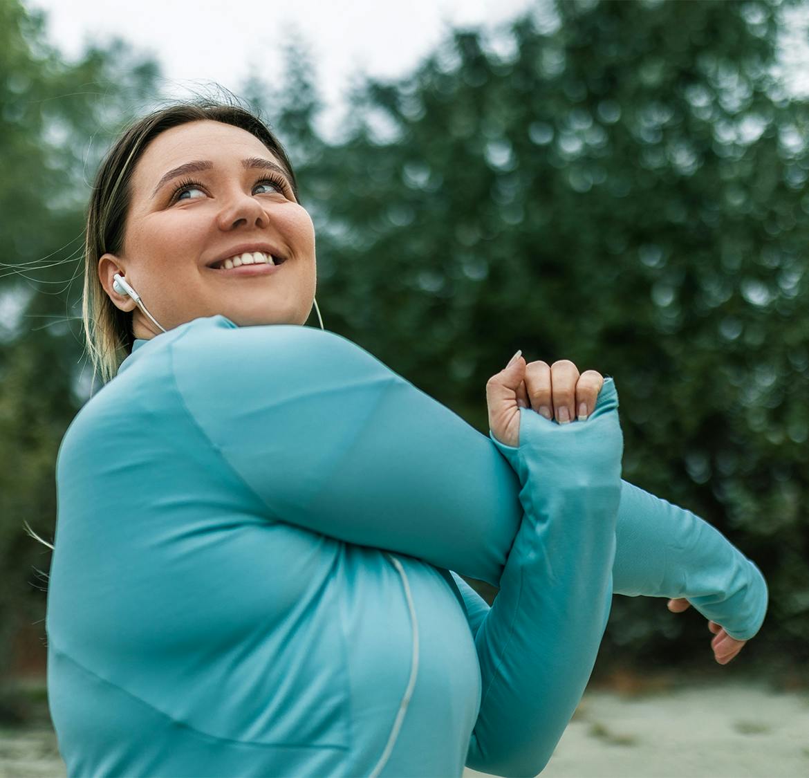 woman stretching her arm