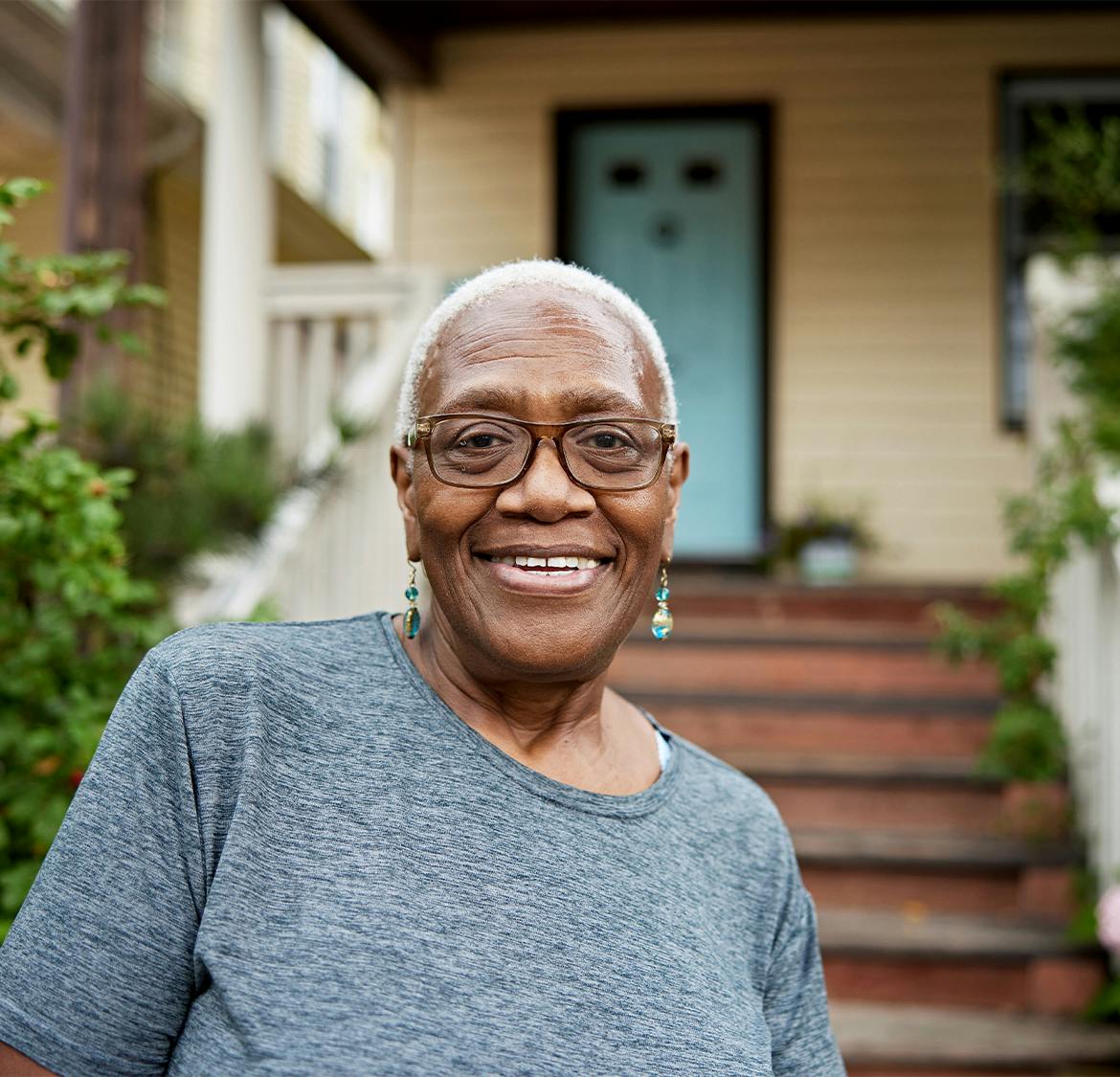 older woman wearing dangly earrings