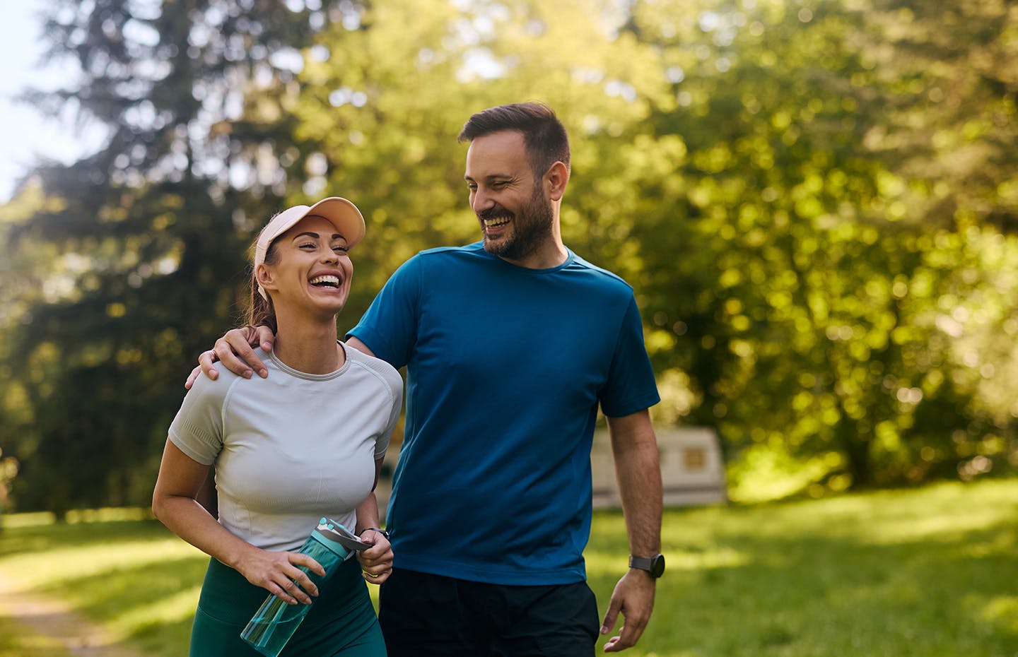 couple laughing while walking