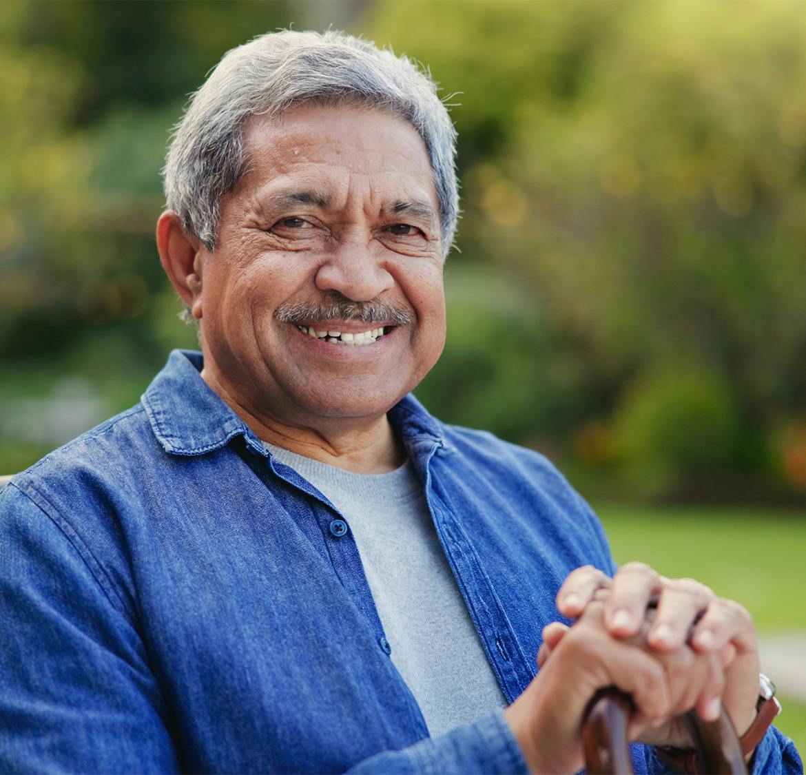 older man wearing a blue shirt