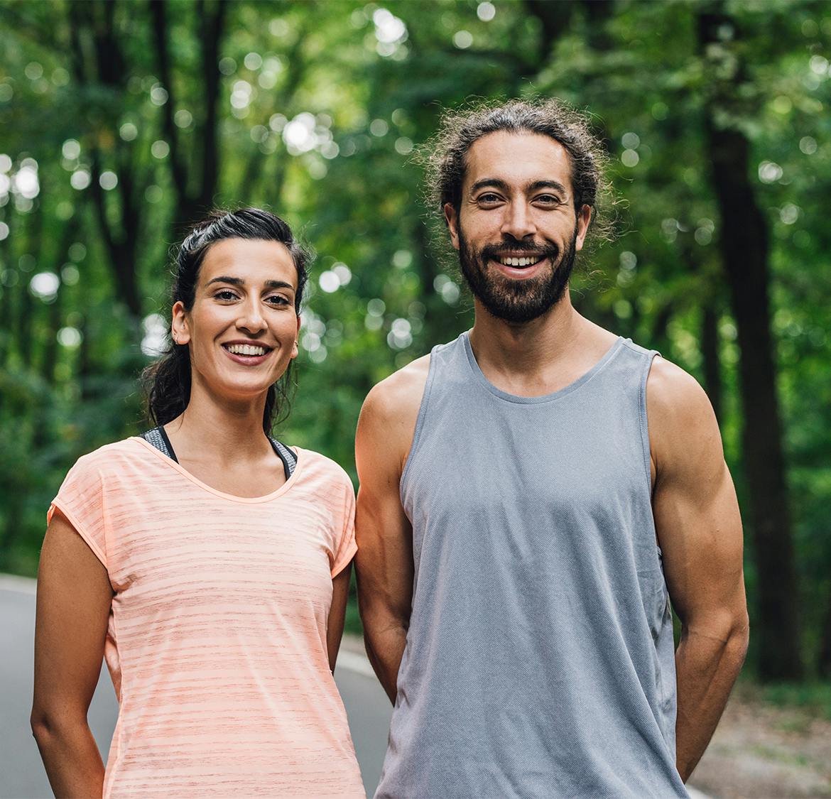 couple smiling outside
