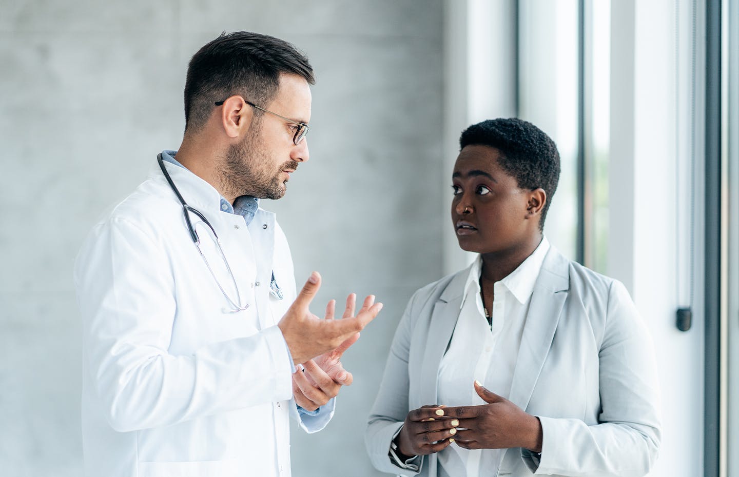 doctor speaking to patient