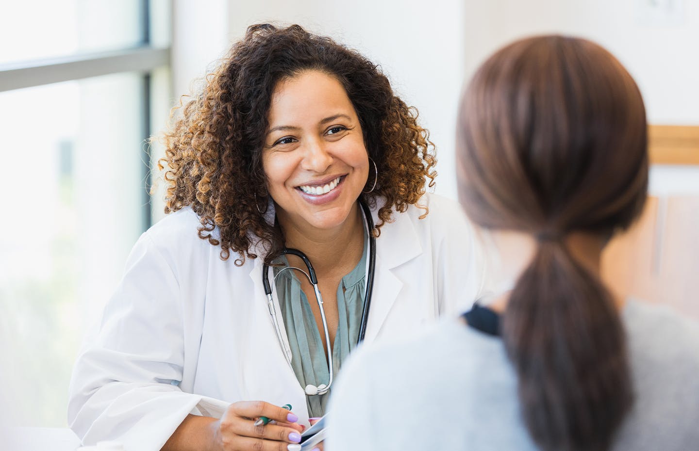 doctor smiling to patient