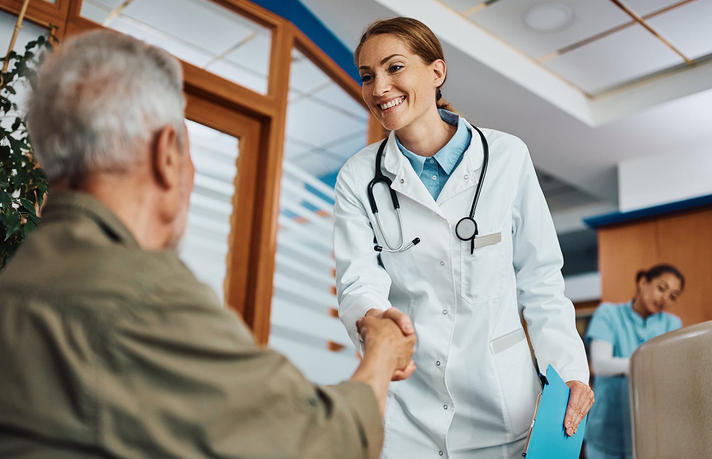 doctor shaking patient's hand