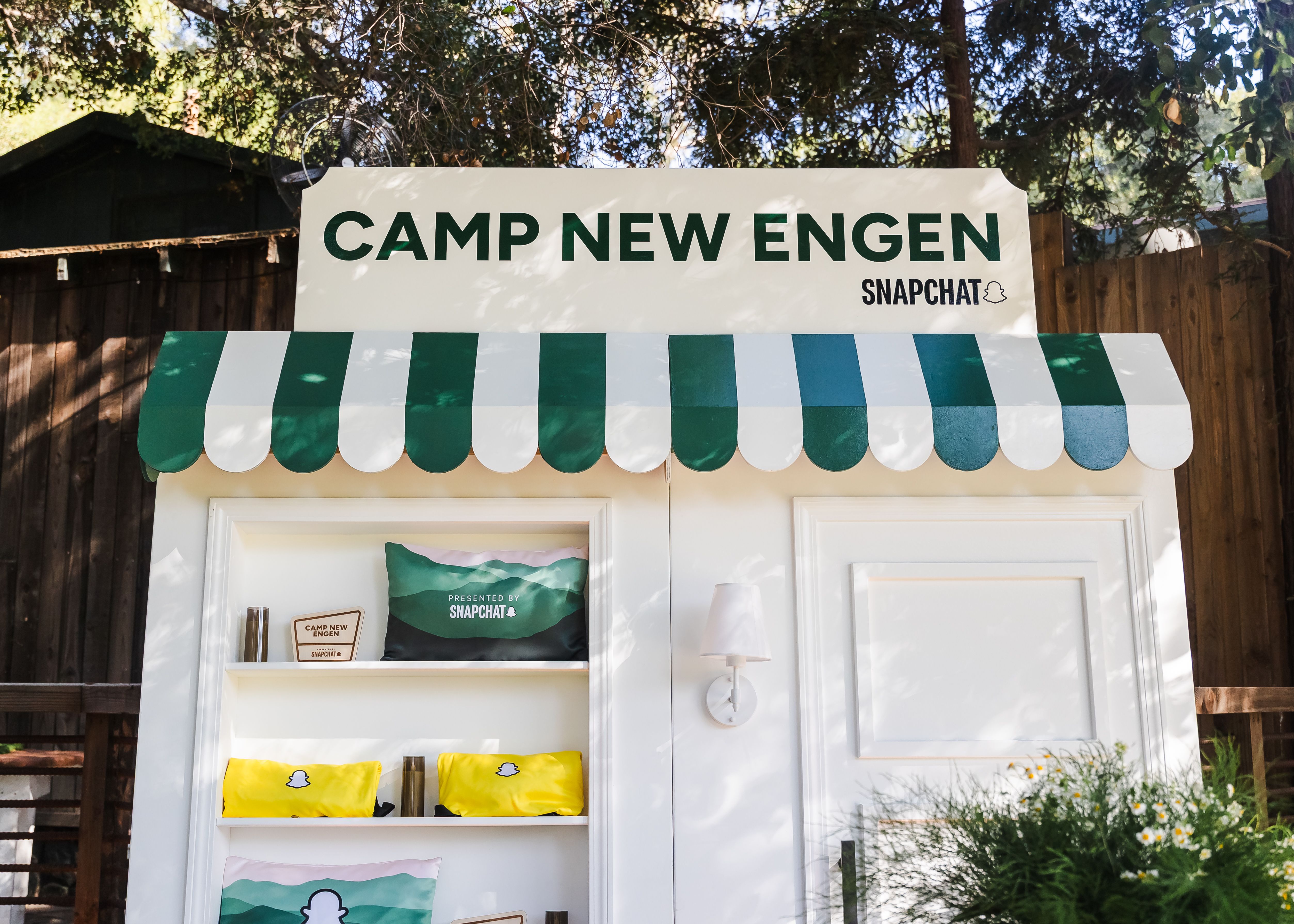 Snapchat partner activation with Camp New Engen 2026 signage and branded display at the marketing summit in Malibu.