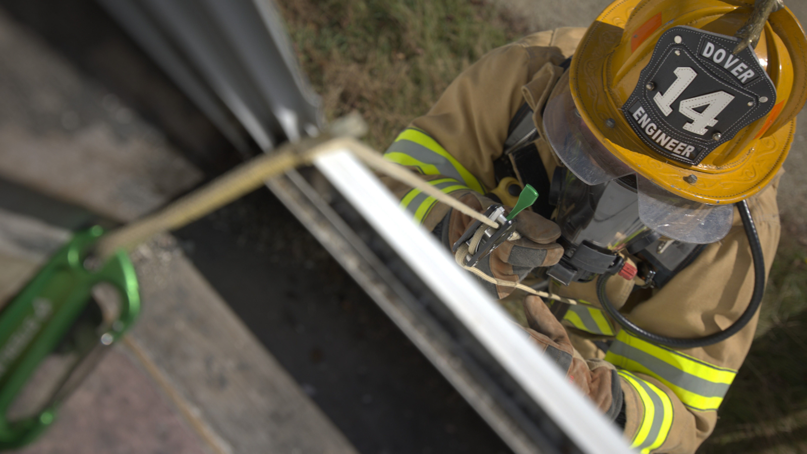 Firefighter escaping through a window