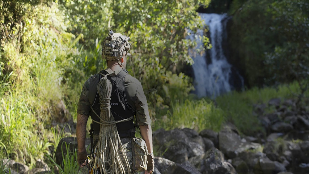 Man with tactical rope on his back