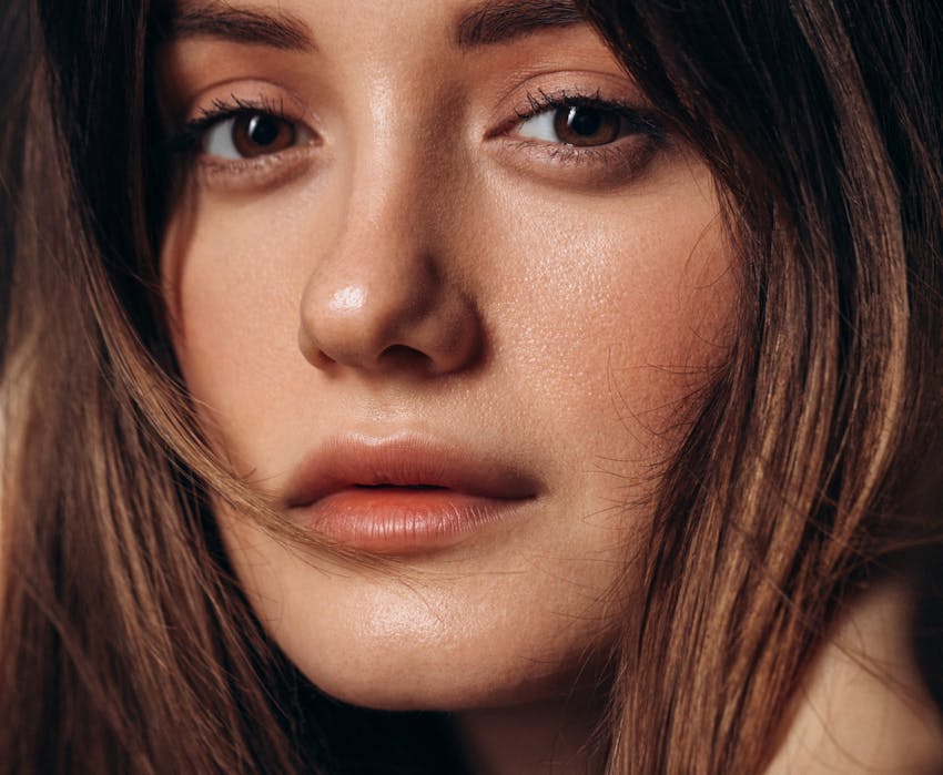 close up of woman looking into camera