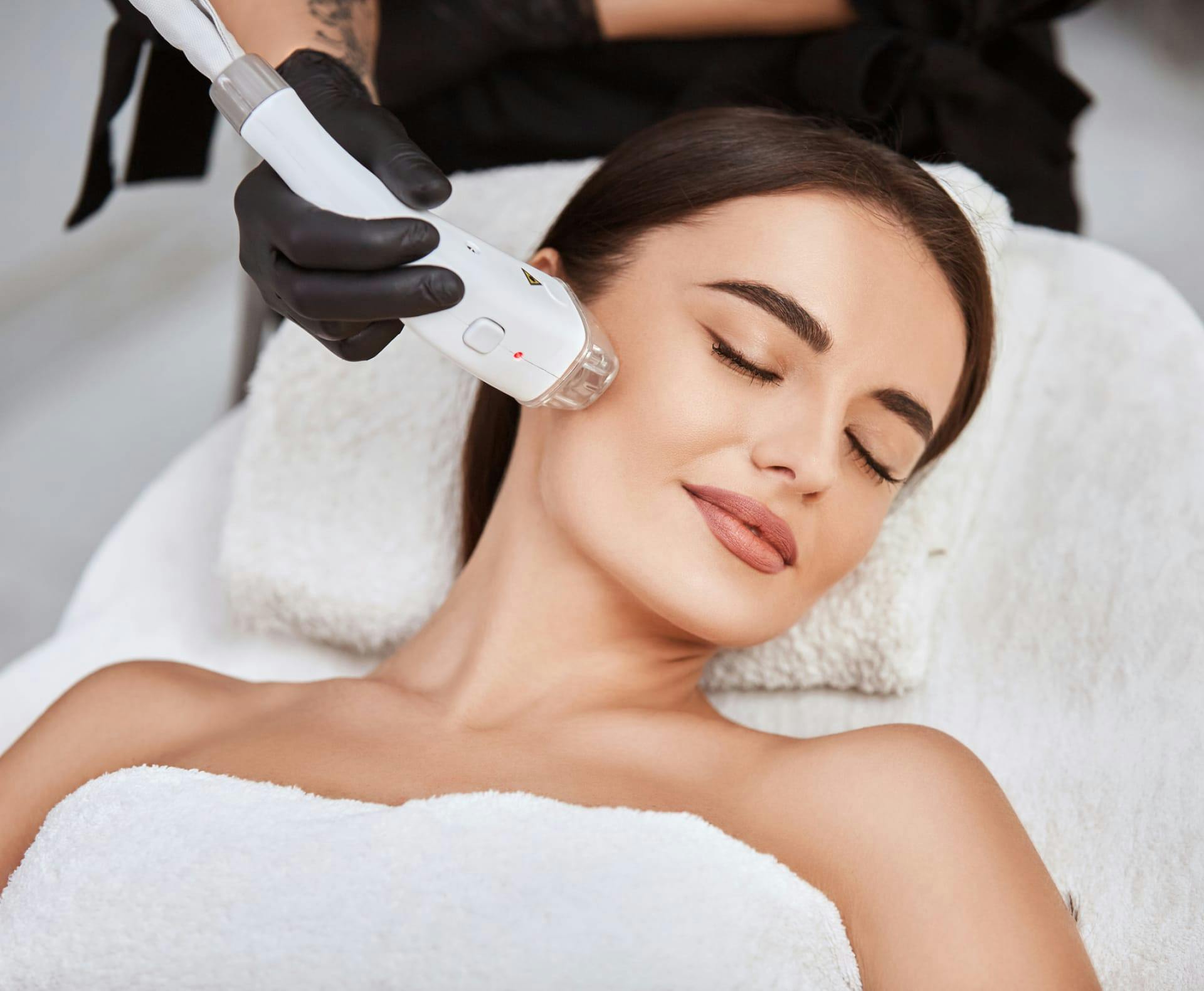 woman getting laser treatment
