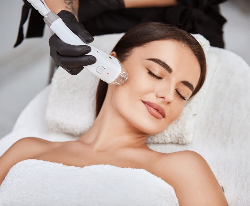 woman getting laser treatment