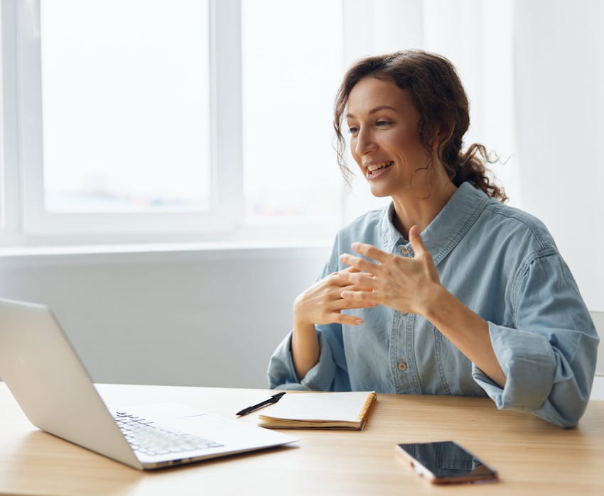 woman talking to computer