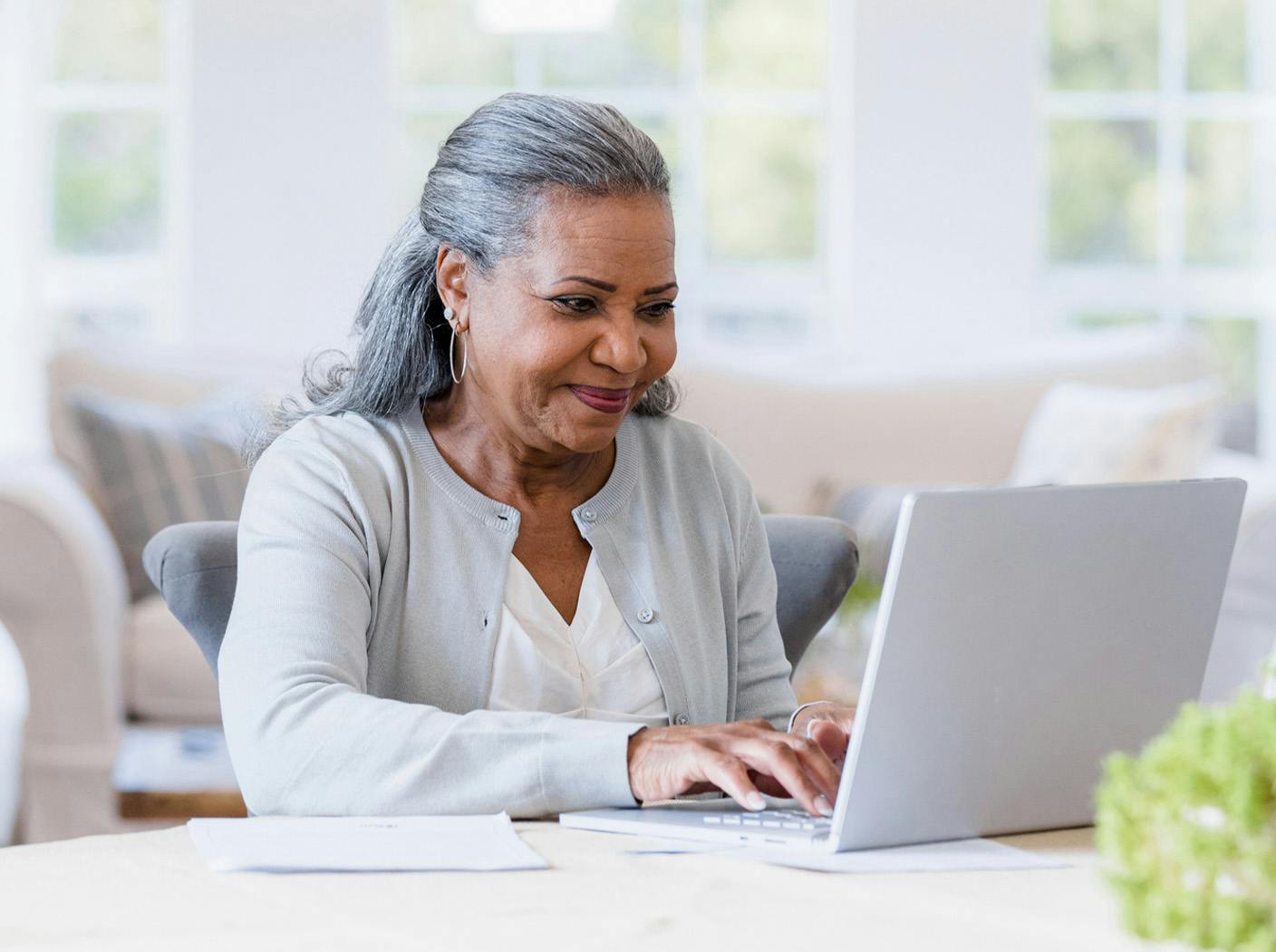 older woman on laptop