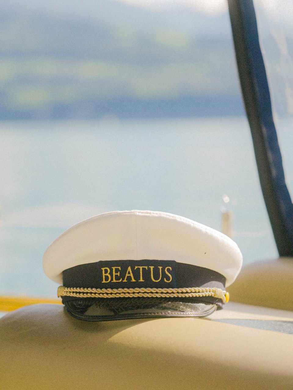Captain's cap in the MS BEATUS II Captain's cap with the inscription ‘BEATUS’ in a ship on the lake